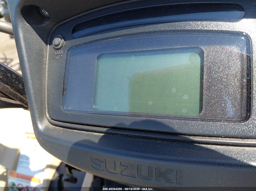 2025 Suzuki VIN 5SADW11E1S7100153 IAAI salvage auction — SIDE, Salvage (Arizona), sold $4,750 on 2026-07-14 (photo 7)