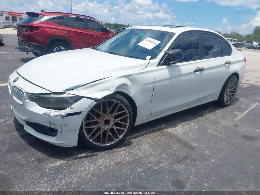 2015 BMW 3er VIN WBA3B1G56FNT06515 IAAI salvage auction — LEFT FRONT, Rebuildable (Florida), sold $1,050 on 2026-07-30 (photo 2)