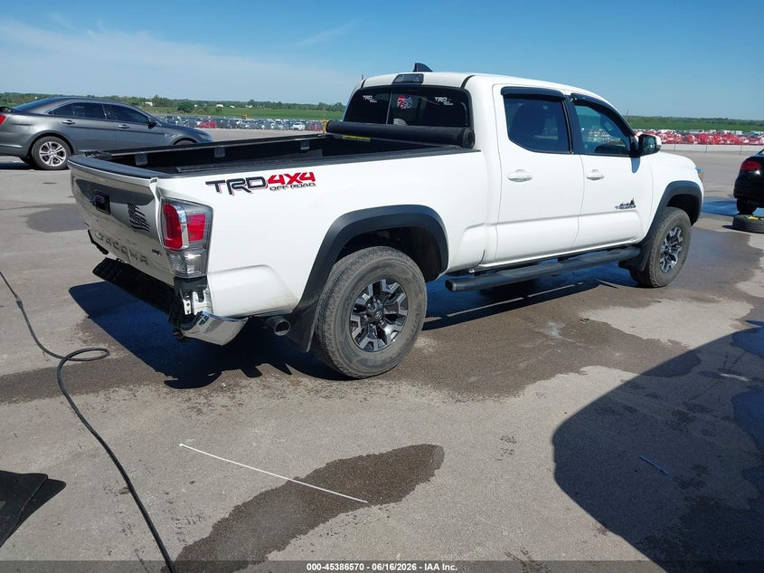 2021 Toyota Tacoma VIN 3TMDZ5BN6MM113743 IAAI salvage auction — REAR END, Salvage (Nebraska), sold $17,600 on 2026-07-30 (photo 4)