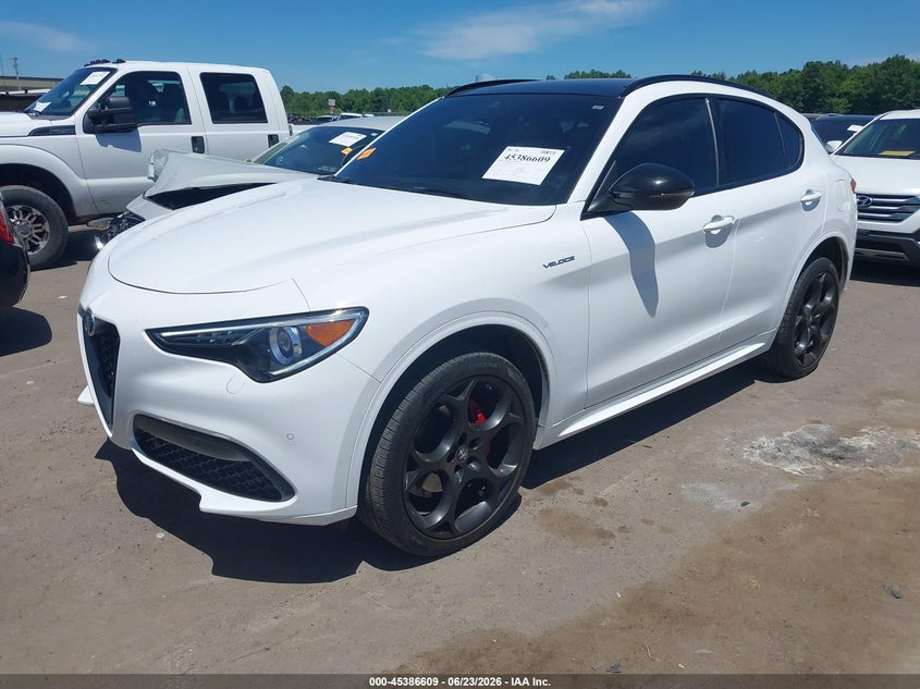 2023 Alfa romeo Stelvio VIN ZASPAKBN3P7D66298 IAAI salvage auction — HAIL, Salvage Title, sold $17,200 on 2026-08-25 (photo 2)