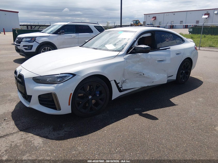 2023 BMW M440i Gran Coupe VIN WBA13AW07PFN83163 IAAI salvage auction — Side, Salvage (Minnesota), sold $23,625 on 2026-08-31 (photo 2)