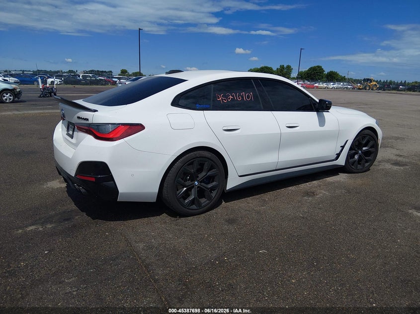 2023 BMW M440i Gran Coupe VIN WBA13AW07PFN83163 IAAI salvage auction — Side, Salvage (Minnesota), sold $23,625 on 2026-08-31 (photo 4)
