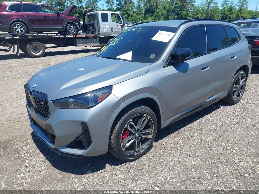 2026 BMW X1 VIN WBX13EF0XT5531376 IAAI salvage auction — FRONT & REAR, Salvage Title, sold $23,125 on 2026-08-20 (photo 2)