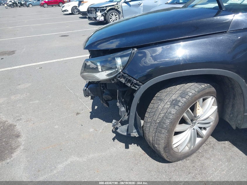 2012 Volkswagen Tiguan VIN WVGBV7AX2CW609358 IAAI salvage auction — BIO HAZARD, Salvage Title, sold $400 on 2026-07-16 (photo 6)