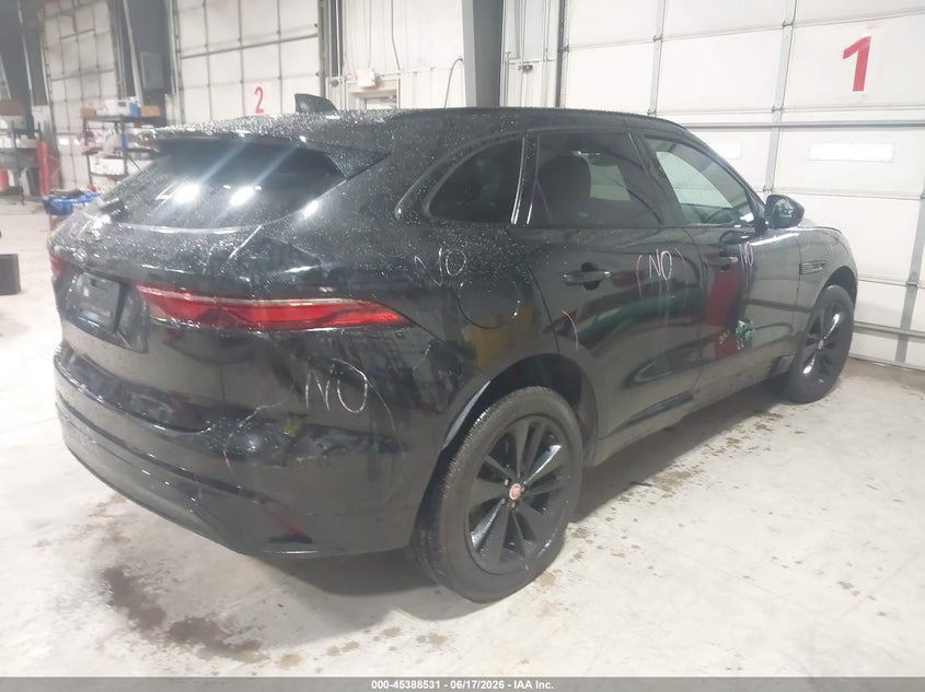 2022 Jaguar F-pace VIN SADCJ2EX4NA699862 IAAI salvage auction — SIDE, Salvage Title, sold $9,350 on 2026-09-01 (photo 4)