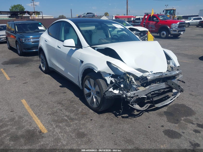 2023 Tesla Model y VIN 7SAYGDEE9PF797597 IAAI salvage auction — LEFT FRONT, Salvage Title, sold $7,200 on 2026-07-29 (photo 1)