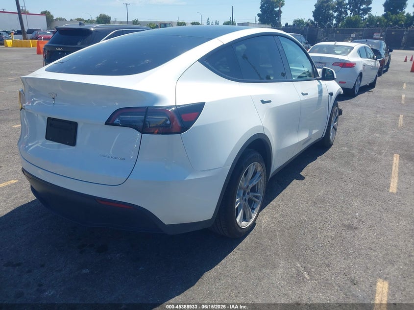 2023 Tesla Model y VIN 7SAYGDEE9PF797597 IAAI salvage auction — LEFT FRONT, Salvage Title, sold $7,200 on 2026-07-29 (photo 4)