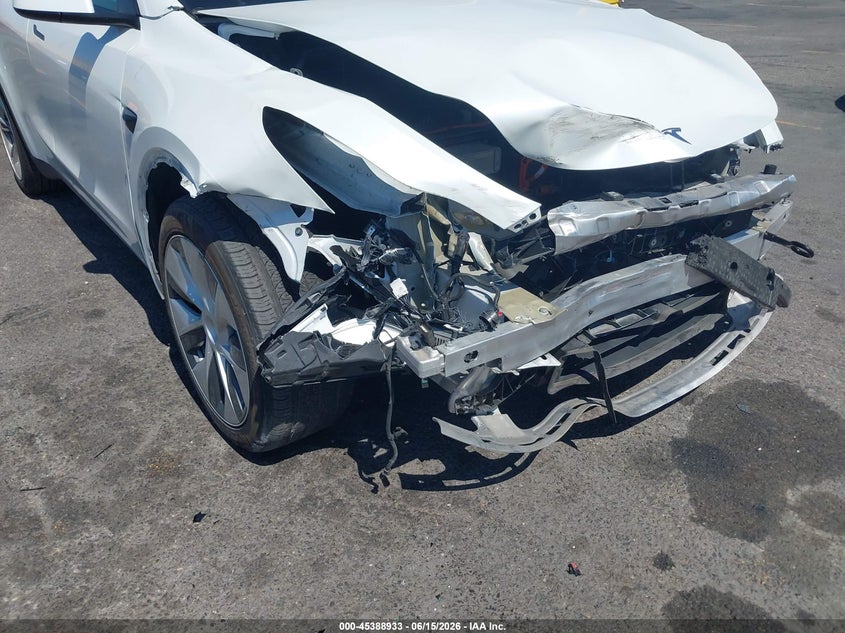 2023 Tesla Model y VIN 7SAYGDEE9PF797597 IAAI salvage auction — LEFT FRONT, Salvage Title, sold $7,200 on 2026-07-29 (photo 6)