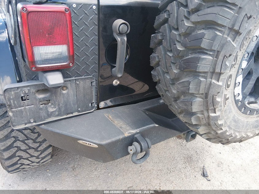2009 Jeep Wrangler / VIN 1J4GA59129L709085 IAAI salvage auction — REAR END, Salvage (West Virginia), sold $2,850 on 2026-07-22 (photo 6)
