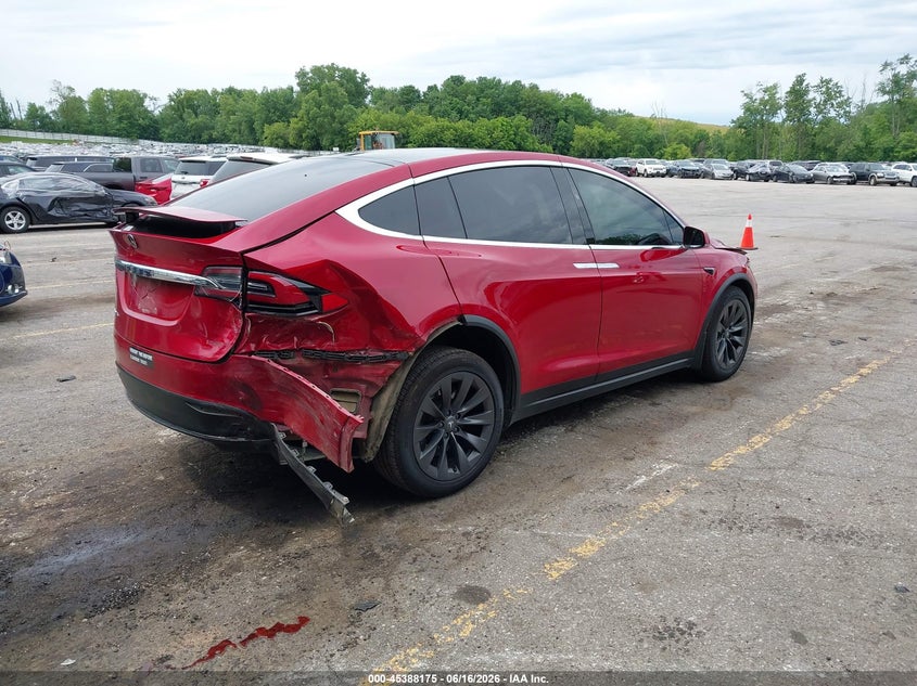 2019 Tesla Model x VIN 5YJXCDE27KF157195 IAAI salvage auction — REAR END, Clear (Michigan), sold $6,700 on 2026-07-09 (photo 4)