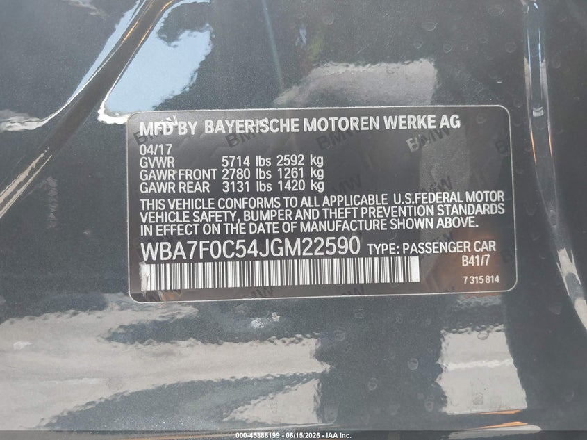 2018 BMW 7er VIN WBA7F0C54JGM22590 IAAI salvage auction — REAR END, Salvage Title, sold $6,575 on 2026-08-18 (photo 9)
