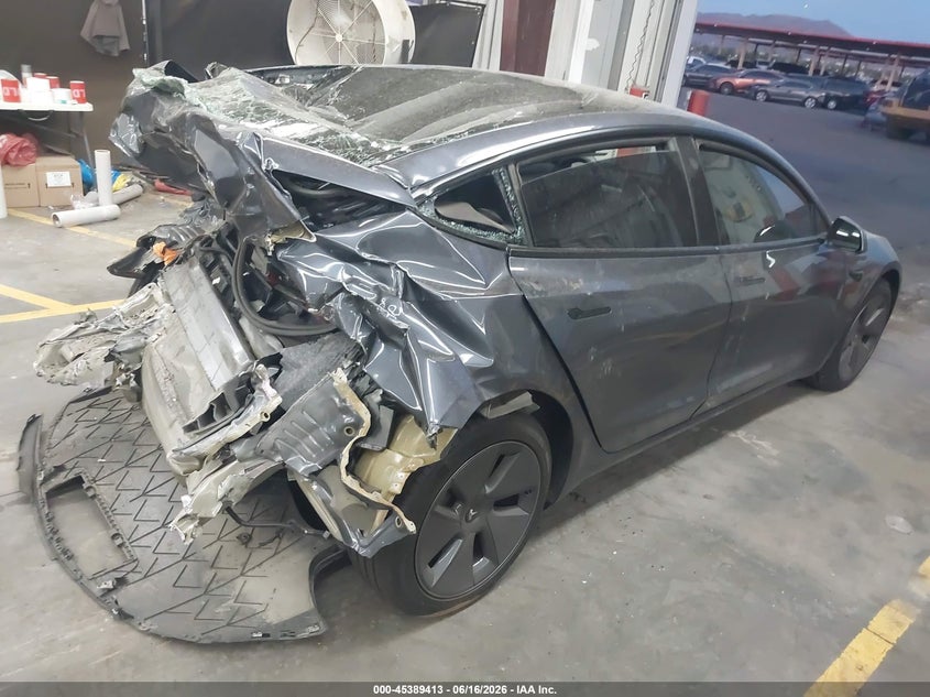 2023 Tesla Model 3 VIN 5YJ3E1EA7PF491054 IAAI salvage auction — REAR END, Salvage (Arizona), sold $4,100 on 2026-07-16 (photo 4)