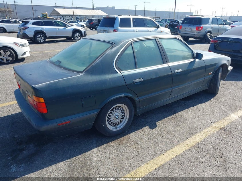 1995 BMW 5 series VIN WBAHE2326SGE91200 IAAI salvage auction — NORMAL WEAR, Clear - Dealer Only (California), sold $200 on 2026-07-14 (photo 4)