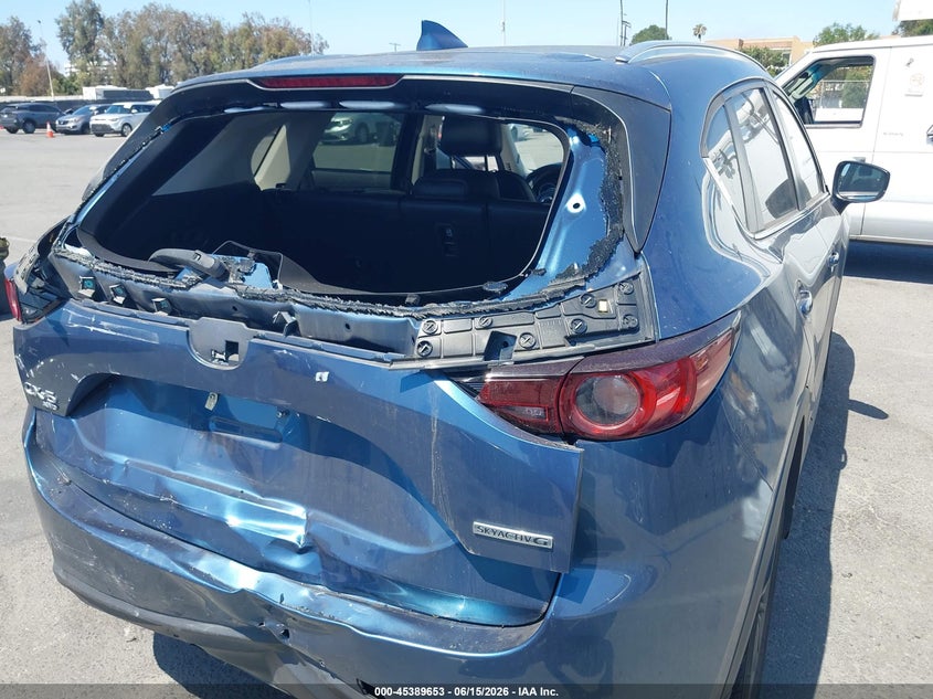 2021 Mazda Cx-5 VIN JM3KFBCM4M0442438 IAAI salvage auction — FRONT & REAR, Salvage (California), sold $8,675 on 2026-09-05 (photo 6)