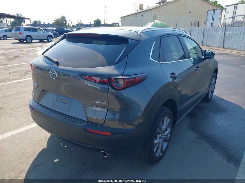 2023 Mazda Cx-30 VIN 3MVDMBBMXPM552693 IAAI salvage auction — SIDE, Original (Texas), sold $9,950 on 2026-08-25 (photo 4)