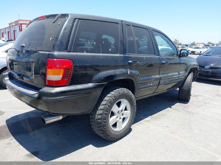 2001 Jeep Grand cherokee VIN 1J4GX58S21C711044 IAAI salvage auction — LEFT FRONT, Salvage (California), sold $550 on 2026-07-09 (photo 4)