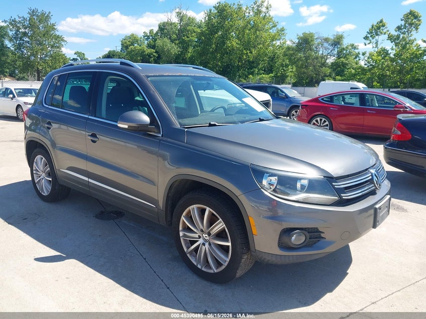 2013 Volkswagen Tiguan VIN WVGAV3AX0DW580979 IAAI salvage auction — NORMAL WEAR, Clear (Illinois), sold $200 on 2026-07-21 (photo 1)