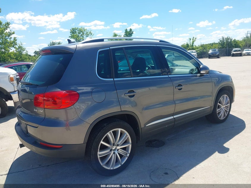 2013 Volkswagen Tiguan VIN WVGAV3AX0DW580979 IAAI salvage auction — NORMAL WEAR, Clear (Illinois), sold $200 on 2026-07-21 (photo 4)
