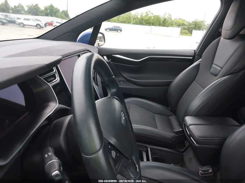 2017 Tesla Model X VIN 5YJXCBE24HF054703 IAAI salvage auction — Normal Wear, Original (Texas), sold $10,500 on 2026-06-27 (photo 7)