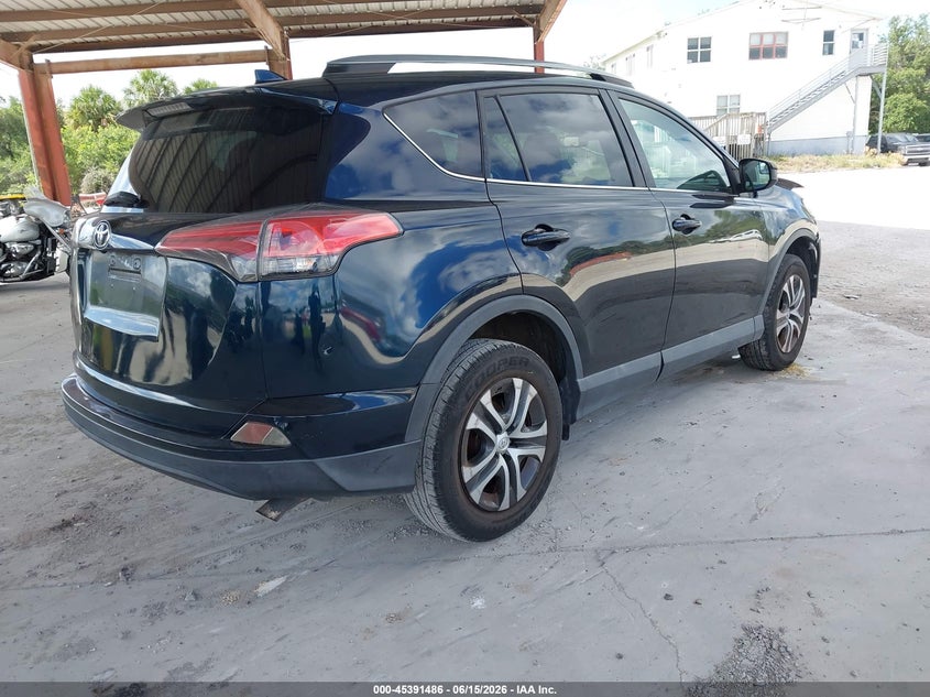 2017 Toyota Rav 4 VIN 2T3BFREV6HW582595 IAAI salvage auction — NORMAL WEAR, Salvage Title, sold $3,450 on 2026-07-25 (photo 4)
