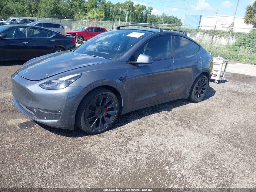 2023 Tesla Model y VIN 7SAYGDEF6PF839250 IAAI salvage auction — RIGHT SIDE, Salvage Title, sold $11,800 on 2026-07-30 (photo 2)