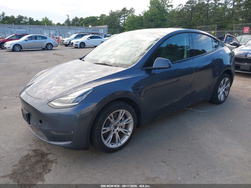 2022 Tesla Model y VIN 7SAYGDEE5NF398442 IAAI salvage auction — WATER/FLOOD, Mv-907A (New York), sold $11,800 on 2026-07-07 (photo 2)