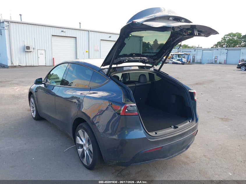 2022 Tesla Model y VIN 7SAYGDEE5NF398442 IAAI salvage auction — WATER/FLOOD, Mv-907A (New York), sold $11,800 on 2026-07-07 (photo 3)