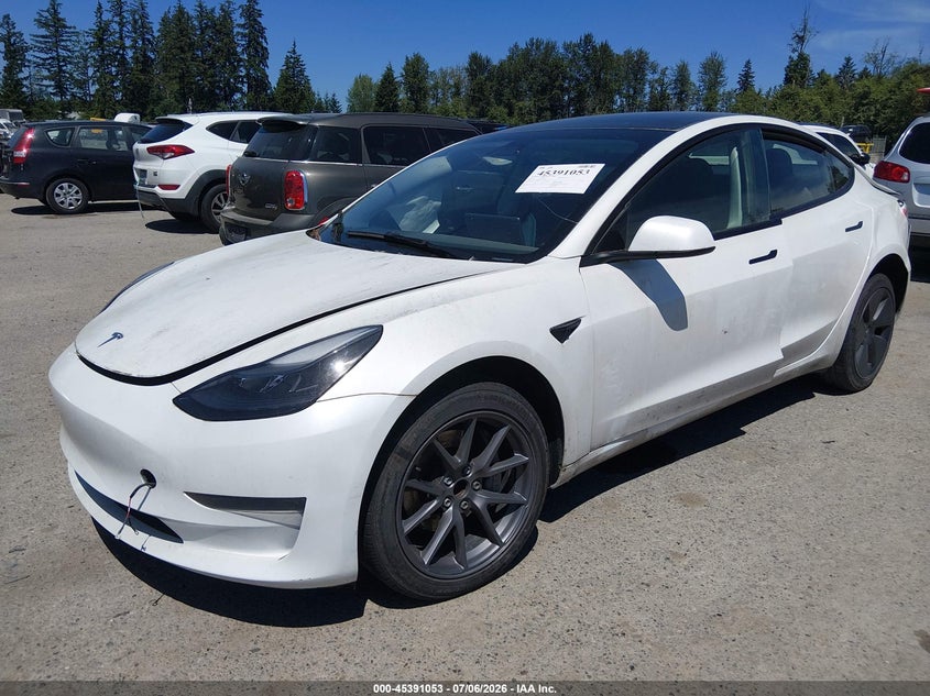 2023 Tesla Model 3 VIN 5YJ3E1EA1PF576312 IAAI salvage auction — FRONT & REAR, Salvage Title, sold $2,050 on 2026-07-29 (photo 2)