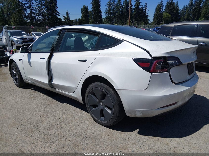2023 Tesla Model 3 VIN 5YJ3E1EA1PF576312 IAAI salvage auction — FRONT & REAR, Salvage Title, sold $2,050 on 2026-07-29 (photo 3)
