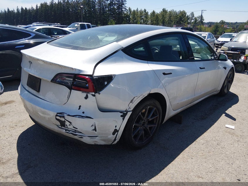 2023 Tesla Model 3 VIN 5YJ3E1EA1PF576312 IAAI salvage auction — FRONT & REAR, Salvage Title, sold $2,050 on 2026-07-29 (photo 4)