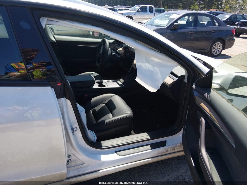 2023 Tesla Model 3 VIN 5YJ3E1EA1PF576312 IAAI salvage auction — FRONT & REAR, Salvage Title, sold $2,050 on 2026-07-29 (photo 5)