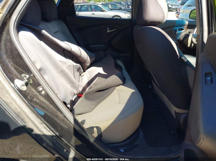 2012 Hyundai Tucson VIN KM8JT3AB5CU318136 IAAI salvage auction — NORMAL WEAR, Clear (Florida), sold $1,250 on 2026-07-10 (photo 8)