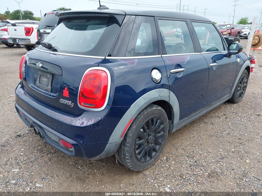 2017 Mini VIN WMWXU3C36H2F48384 IAAI salvage auction — NORMAL WEAR, Original (Texas), sold $2,150 on 2026-07-29 (photo 4)