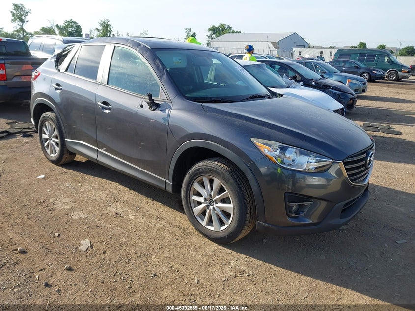 2016 Mazda Cx-5 VIN JM3KE2CY7G0893776 IAAI salvage auction — STORM DAMAGE, Salvage Title, sold $2,150 on 2026-07-30 (photo 1)