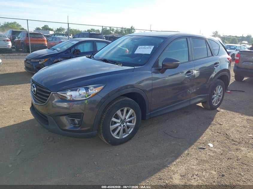 2016 Mazda Cx-5 VIN JM3KE2CY7G0893776 IAAI salvage auction — STORM DAMAGE, Salvage Title, sold $2,150 on 2026-07-30 (photo 2)