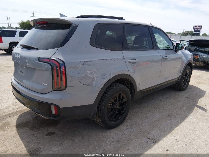 2024 Kia Telluride VIN 5XYP5DGC3RG505660 IAAI salvage auction — STORM DAMAGE, Salvage (Kansas), sold $7,000 on 2026-07-24 (photo 4)