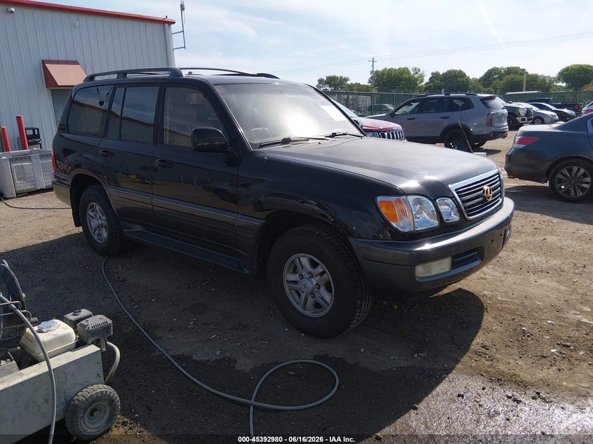 1998 Lexus Lx 470 VIN JT6HT00W4W0010688 IAAI salvage auction — HAIL, Salvage (Kansas), sold $2,850 on 2026-07-11 (photo 1)