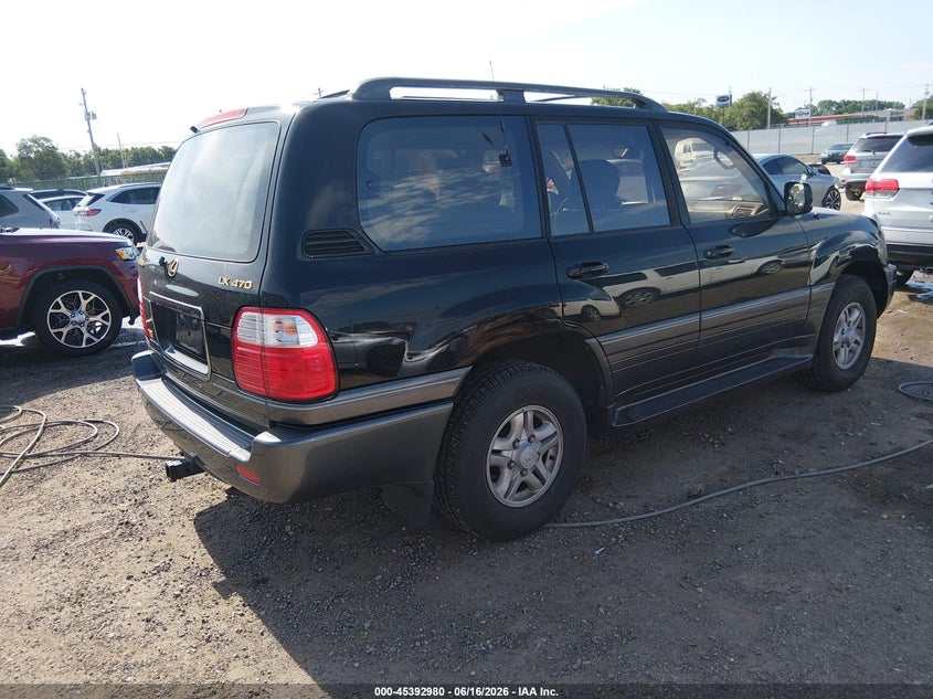 1998 Lexus Lx 470 VIN JT6HT00W4W0010688 IAAI salvage auction — HAIL, Salvage (Kansas), sold $2,850 on 2026-07-11 (photo 4)