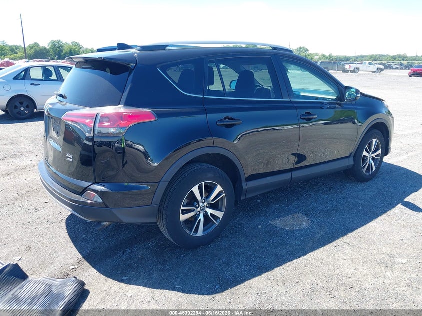2018 Toyota Rav 4 VIN 2T3RFREV9JW713233 IAAI salvage auction — LEFT FRONT, Salvage - 75% Or Less (Maryland), sold $4,800 on 2026-07-24 (photo 4)