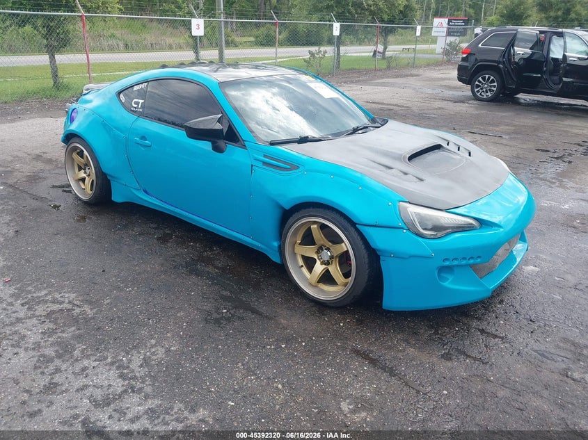 2014 Subaru Brz VIN JF1ZCAC17E9603030 IAAI salvage auction — LEFT SIDE, Rebuildable (Florida), sold $2,125 on 2026-07-21 (photo 1)