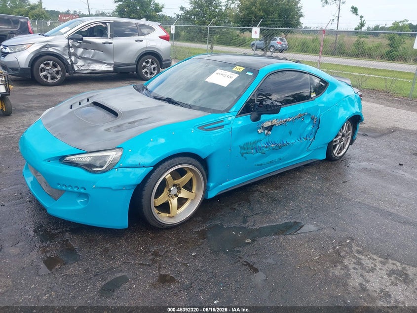 2014 Subaru Brz VIN JF1ZCAC17E9603030 IAAI salvage auction — LEFT SIDE, Rebuildable (Florida), sold $2,125 on 2026-07-21 (photo 2)