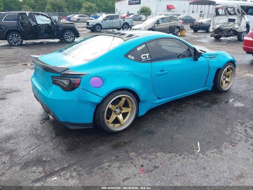 2014 Subaru Brz VIN JF1ZCAC17E9603030 IAAI salvage auction — LEFT SIDE, Rebuildable (Florida), sold $2,125 on 2026-07-21 (photo 4)