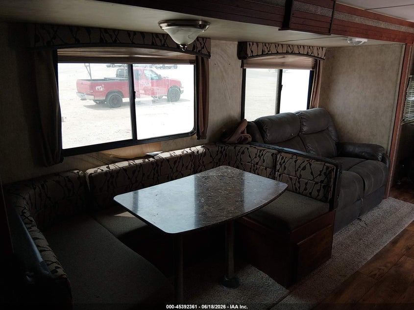 2015 Keystone Passport VIN 4YDT28129FT415859 IAAI salvage auction — ROOF, Salvage (Texas), sold $8,050 on 2026-07-09 (photo 5)