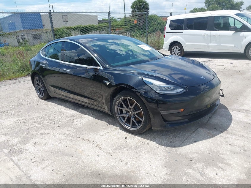 2020 Tesla Model 3 VIN 5YJ3E1EB7LF599807 IAAI salvage auction — FRONT END, Clear (Florida), sold $3,150 on 2026-07-15 (photo 1)