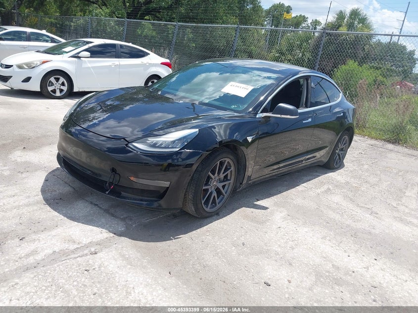 2020 Tesla Model 3 VIN 5YJ3E1EB7LF599807 IAAI salvage auction — FRONT END, Clear (Florida), sold $3,150 on 2026-07-15 (photo 2)