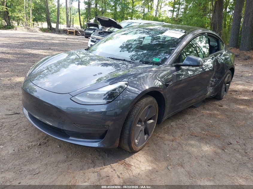 2023 Tesla Model 3 VIN 5YJ3E1EA4PF714456 IAAI salvage auction — REAR END, Salvage Title, sold $8,600 on 2026-07-31 (photo 2)