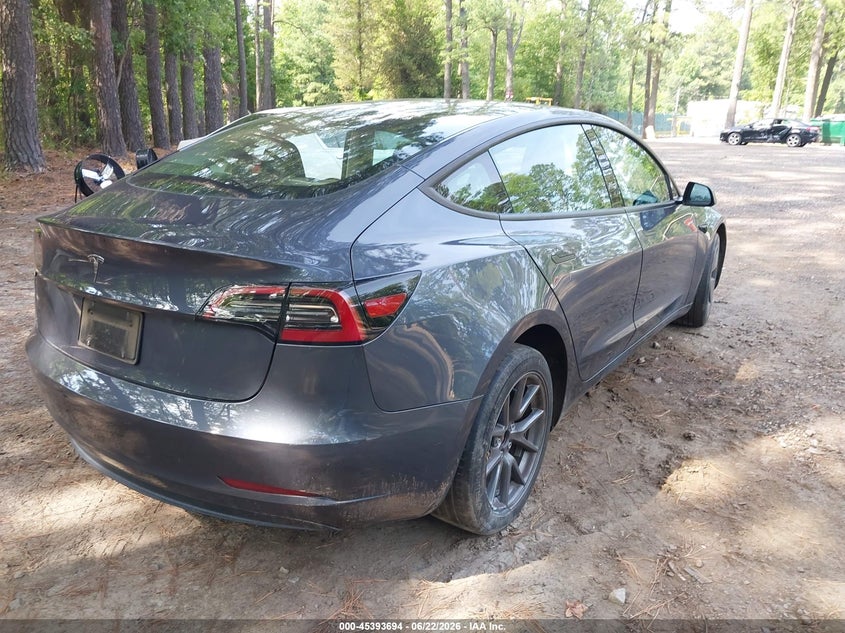 2023 Tesla Model 3 VIN 5YJ3E1EA4PF714456 IAAI salvage auction — REAR END, Salvage Title, sold $8,900 on 2026-07-31 (photo 4)