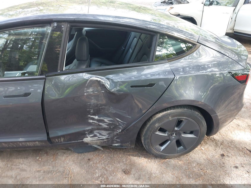2023 Tesla Model 3 VIN 5YJ3E1EA4PF714456 IAAI salvage auction — REAR END, Salvage Title, sold $8,600 on 2026-07-31 (photo 6)
