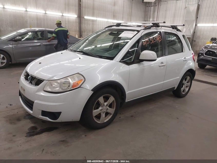 2012 Suzuki Sx4 VIN JS2YB5A35C6304872 IAAI salvage auction — NORMAL WEAR, Salvage Title, sold $325 on 2026-07-21 (photo 2)
