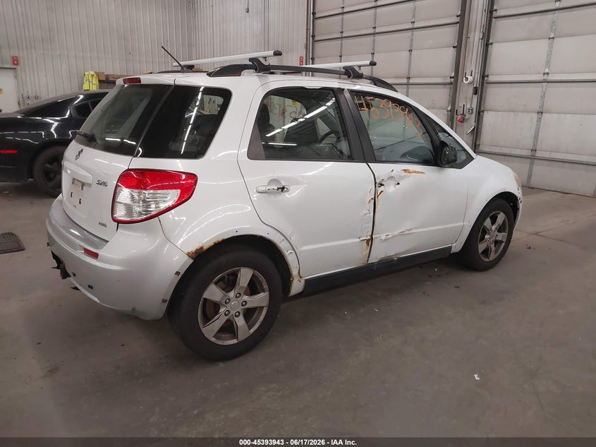 2012 Suzuki Sx4 VIN JS2YB5A35C6304872 IAAI salvage auction — NORMAL WEAR, Salvage Title, sold $325 on 2026-07-21 (photo 4)